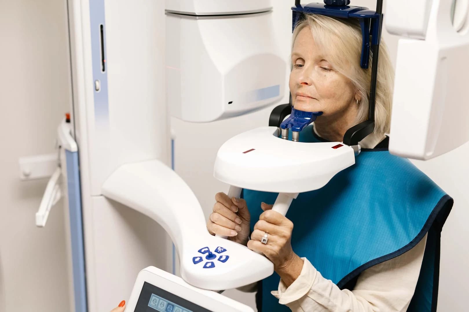 A patient having a panoramic X-ray taken during a second-opinion visit